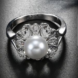 Sterling silver,pearl and white sapphire